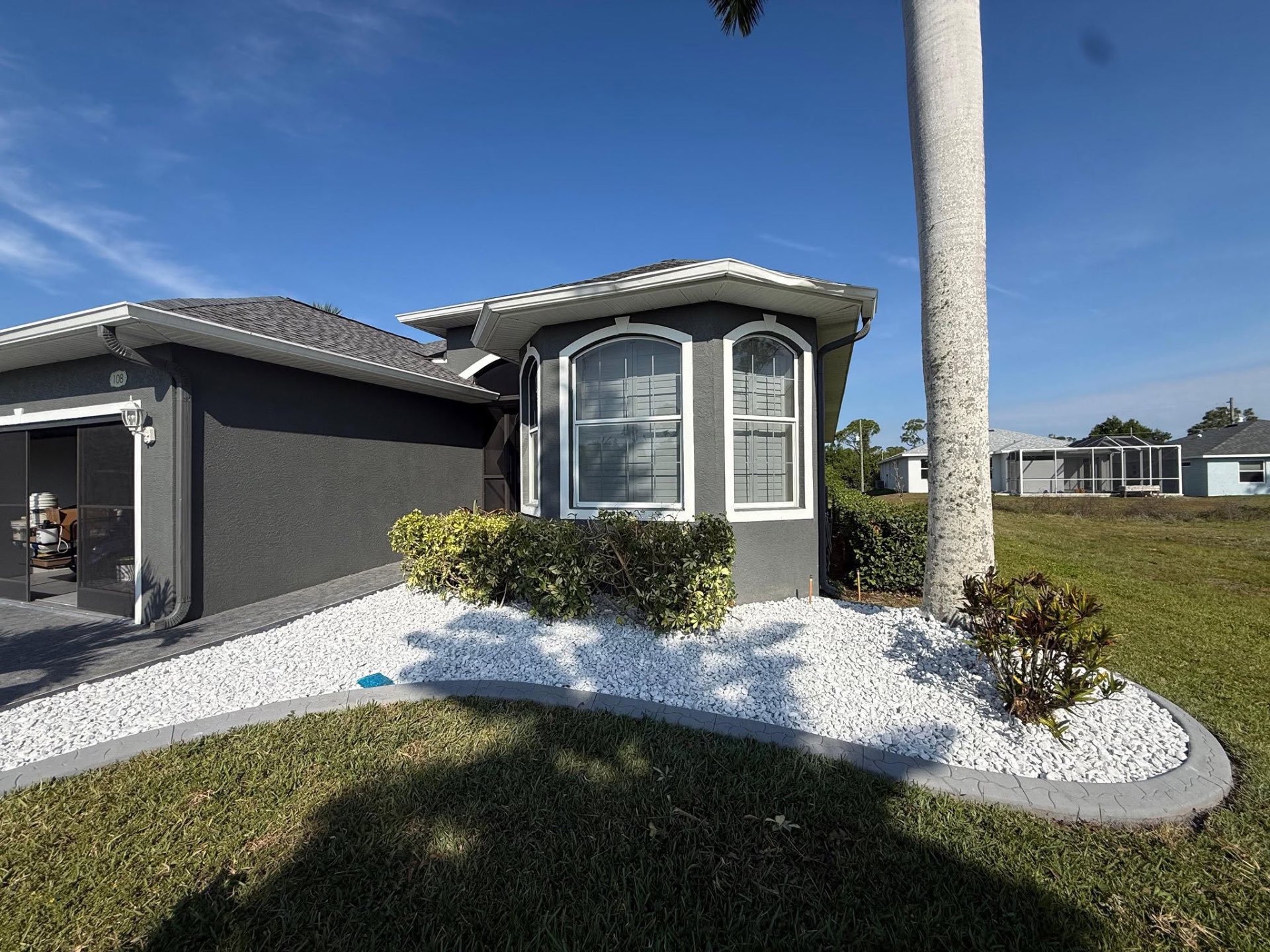 Curbing along a bay-front lawn