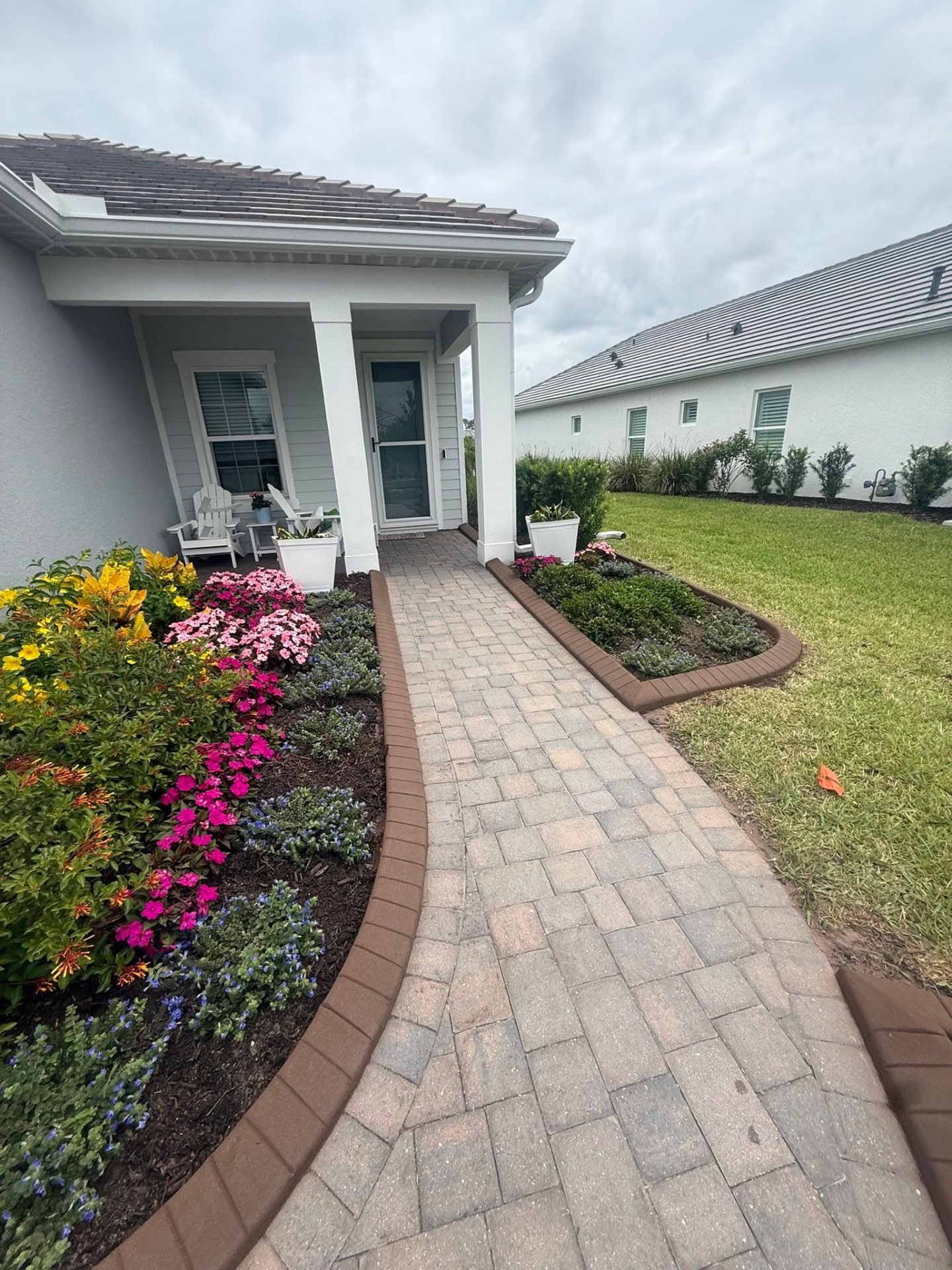 Flower-lined walkway curbing