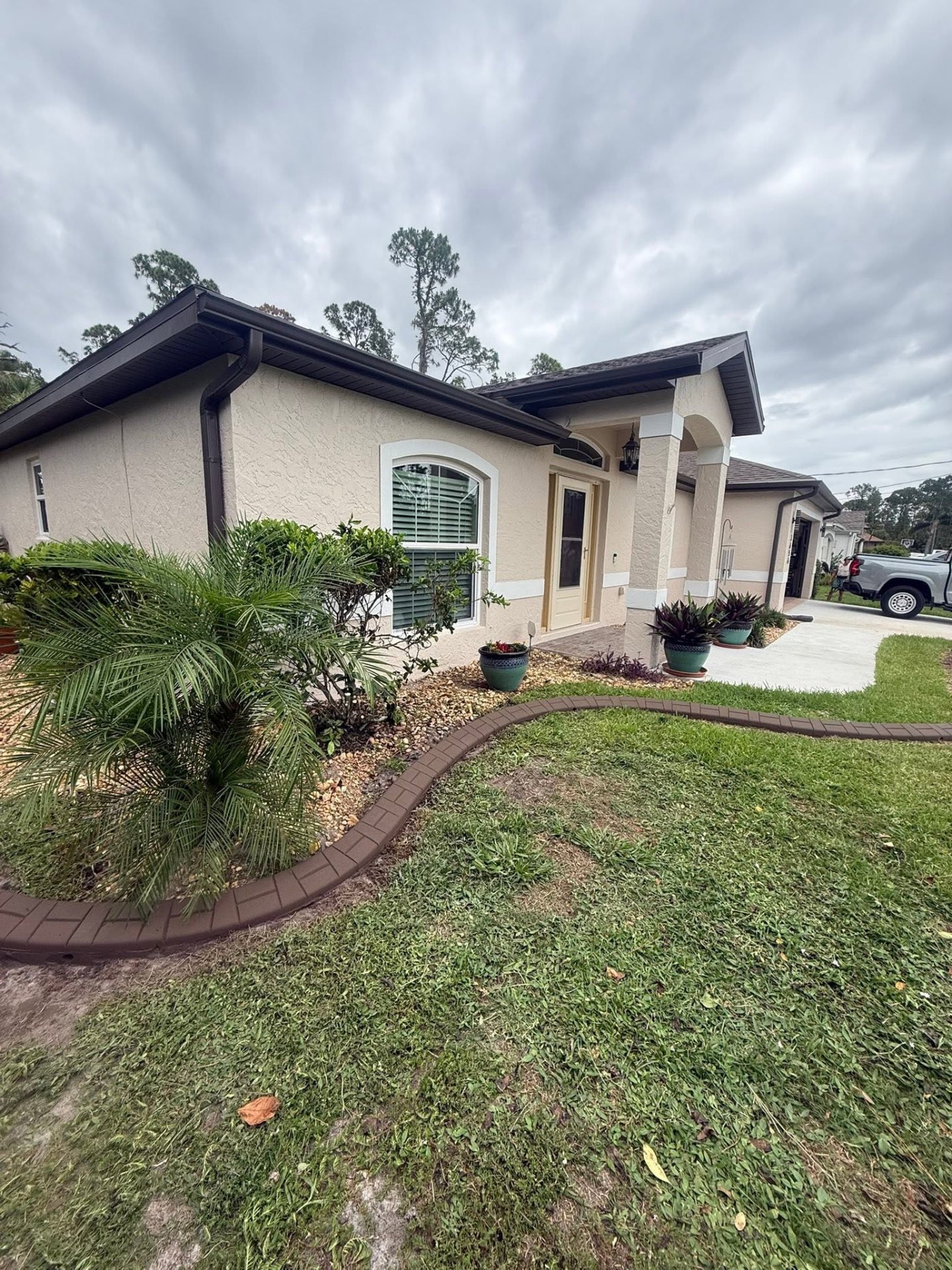 Brown curbing along manicured lawn